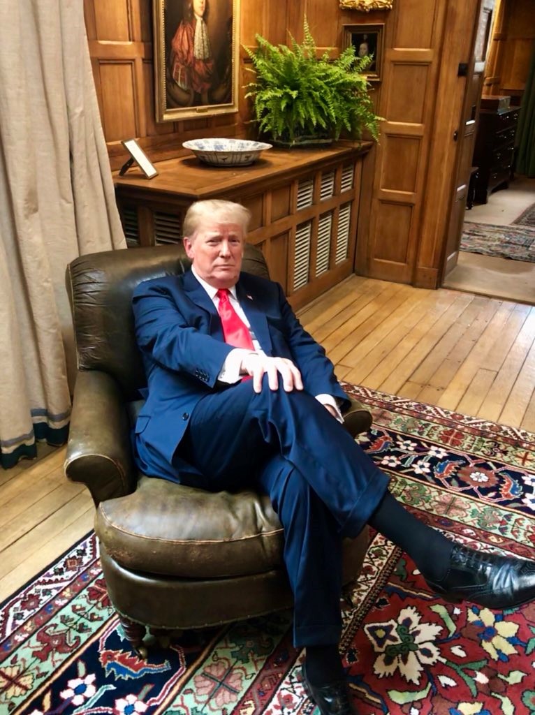 Trump in Churchill chair.jpg